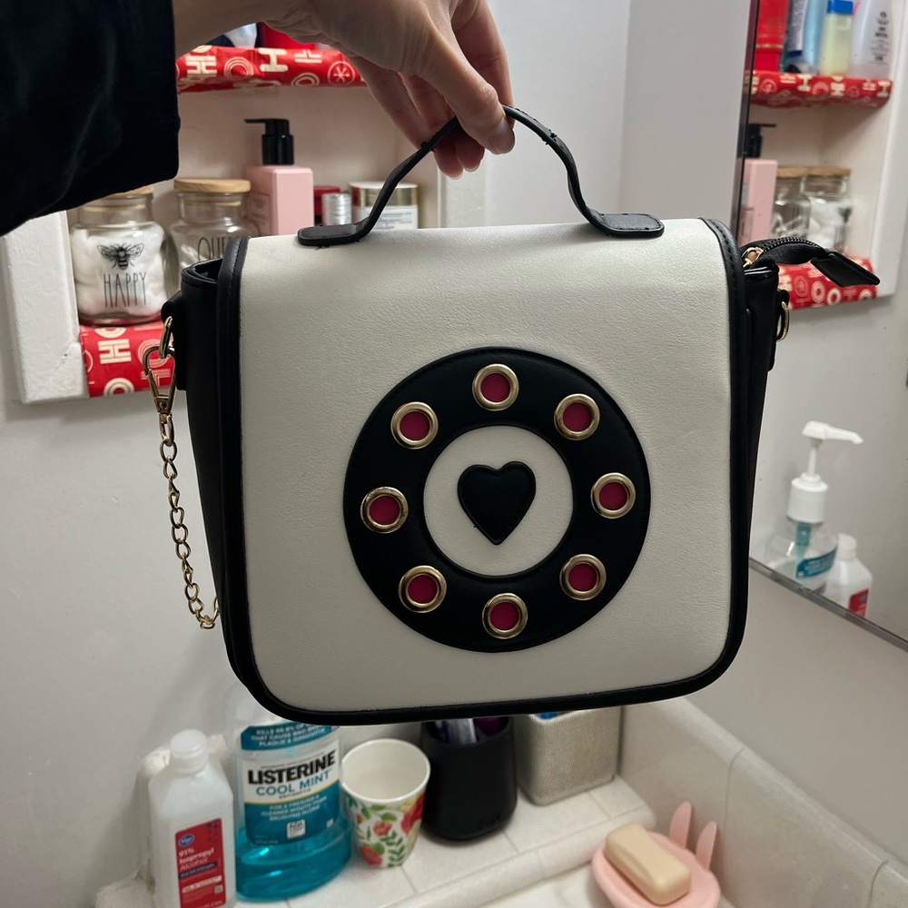 Stylish Black and White Handbag with Heart Design